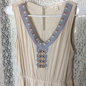 Large asymmetrical cream dress